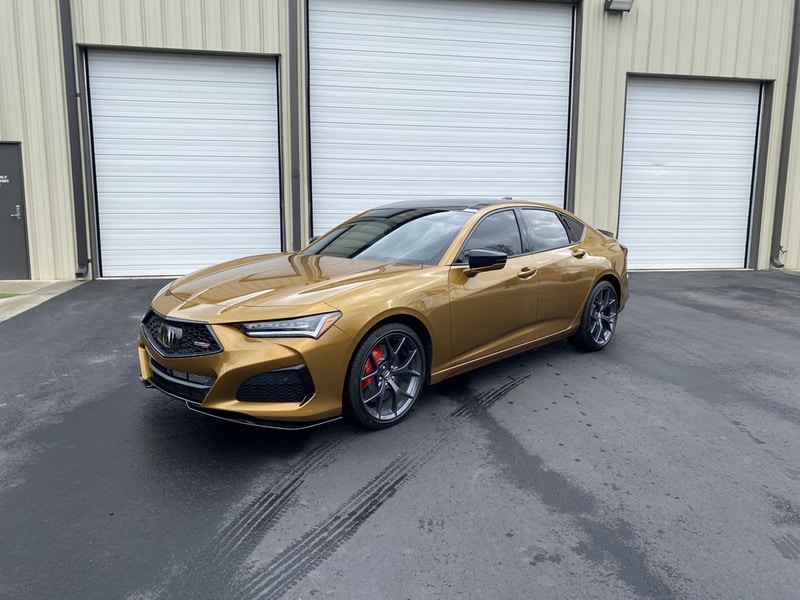 Paint Protection Film PPF on a gold Acura
