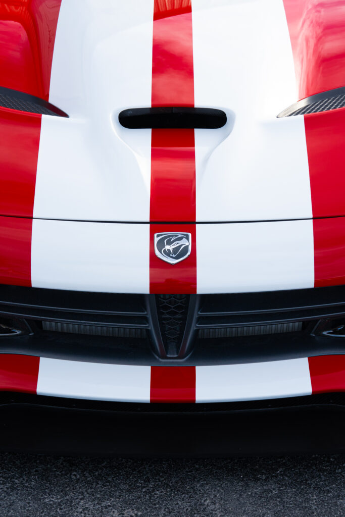 Rally stripes by Atlantic Custom Wraps shown in red and white across a Dodge Viper front end in NC