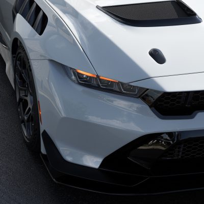 Atlantic Custom Wraps week showcase with a close-up of a white sports car’s hood vent, headlight and grille.