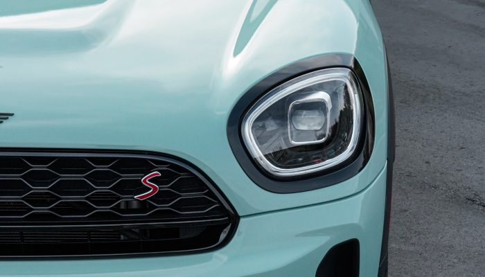 Mint green Mini Cooper with vinyl car wrap on the hood and front panels by Atlantic Custom Wraps in NC